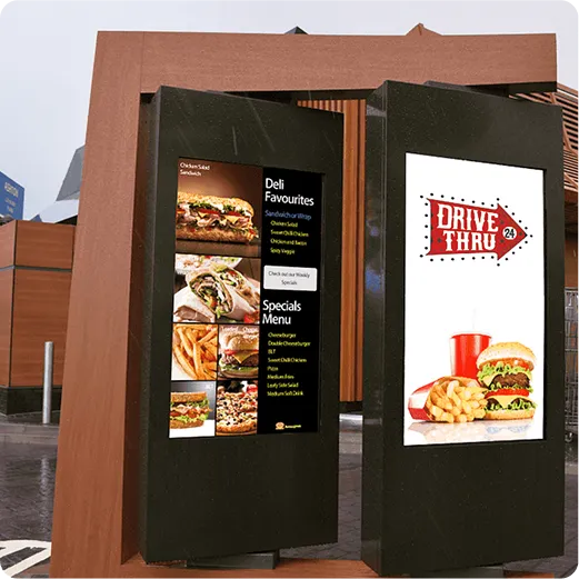 Monitores publicitarios en drive-thru con menú digital y señalización de autoservicio